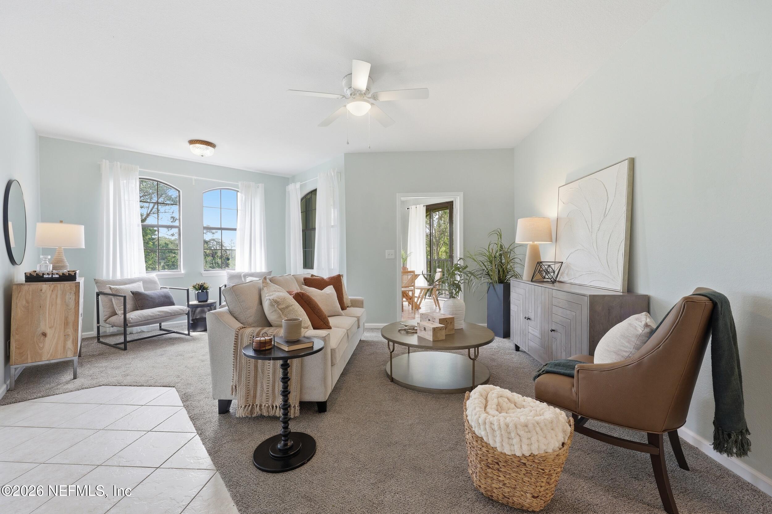 1529 Vista Cove Road St. Augustine, FL 32084 - Photo 15 of 75 a living room with furniture and a large window