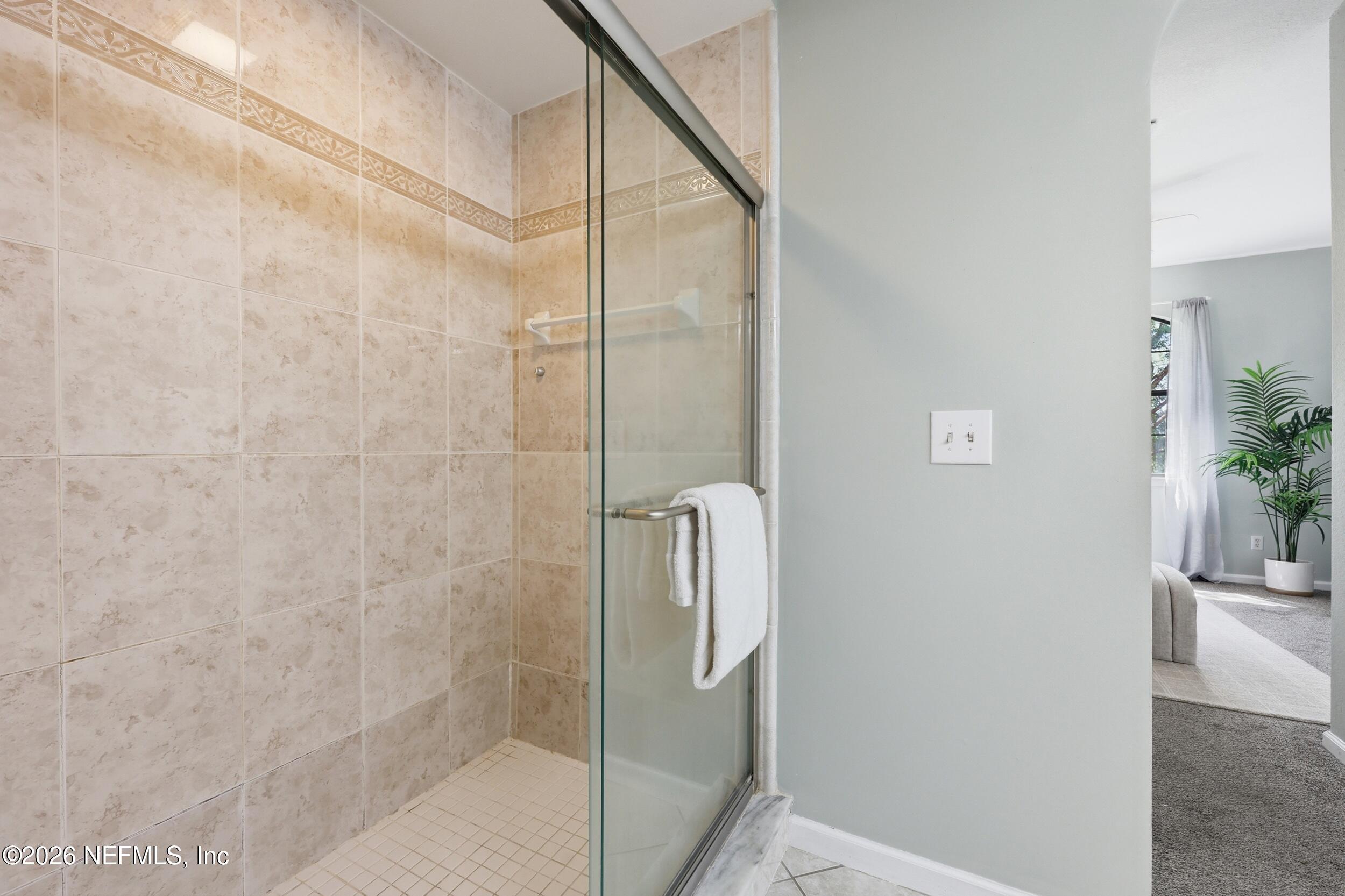 1529 Vista Cove Road St. Augustine, FL 32084 - Photo 26 of 75 a bathroom with a shower