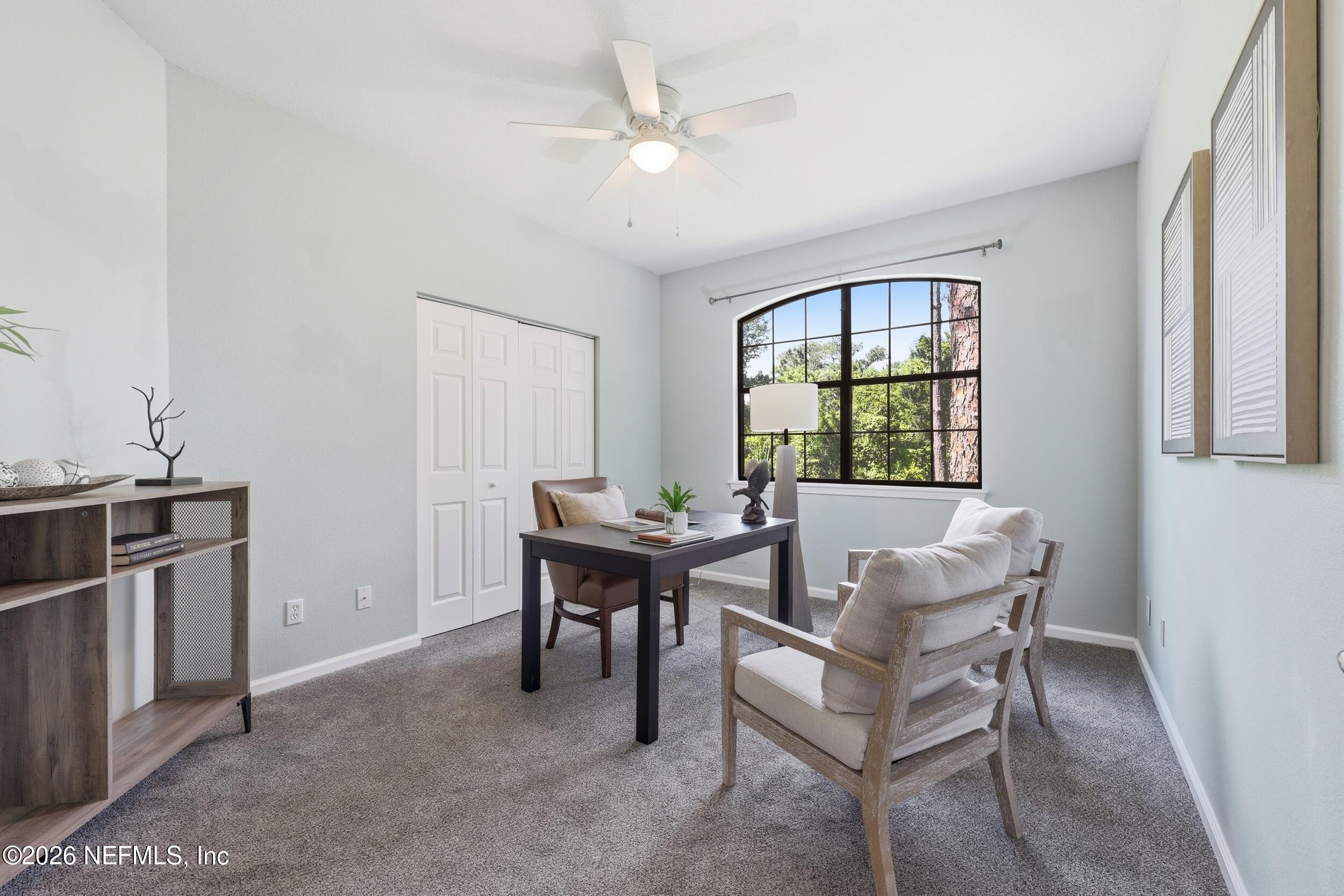 1529 Vista Cove Road St. Augustine, FL 32084 - Photo 28 of 75 a view of a dining room with furniture window and outside view