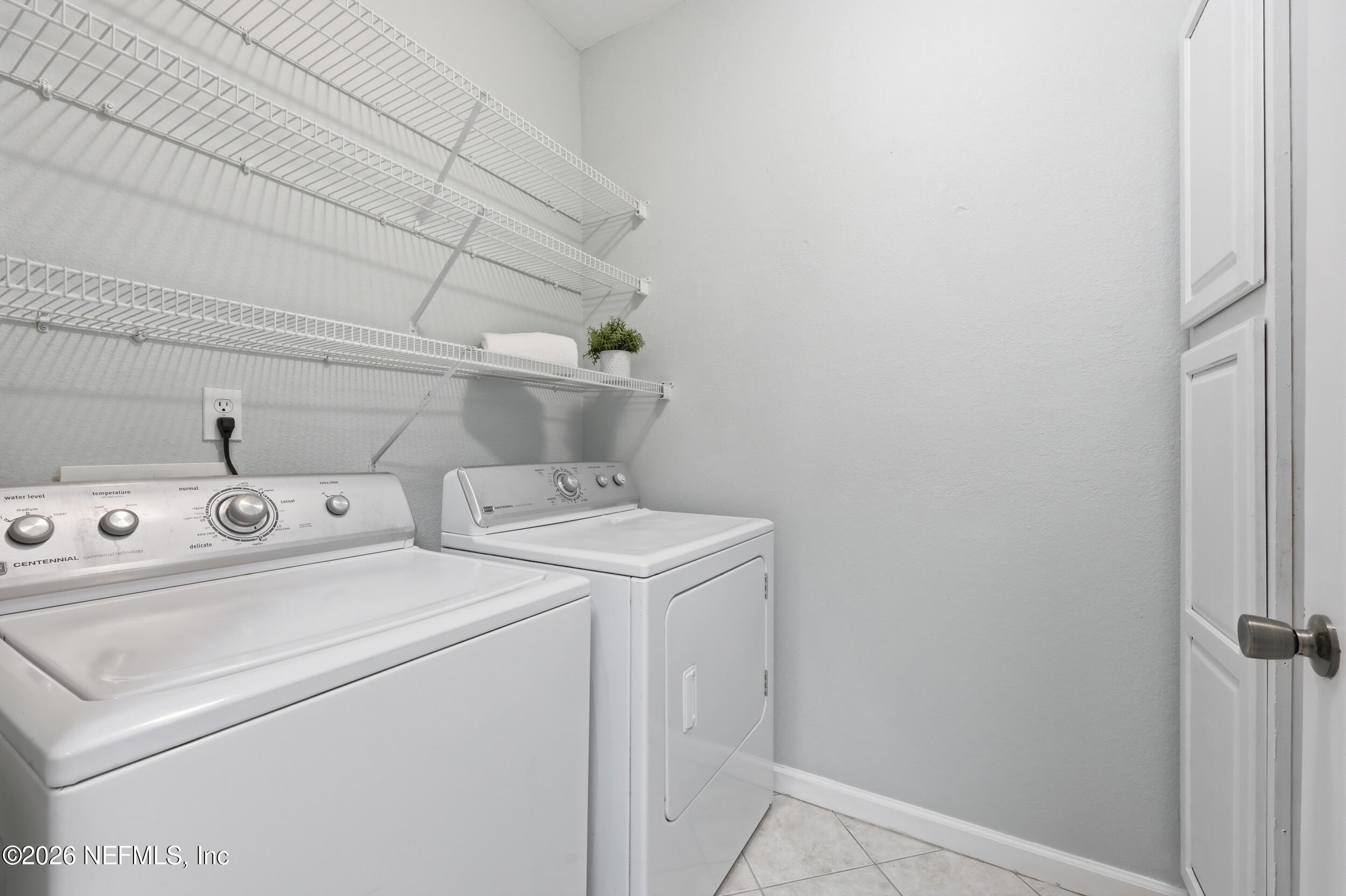 1529 Vista Cove Road St. Augustine, FL 32084 - Photo 36 of 75 a utility room with dryer and washer