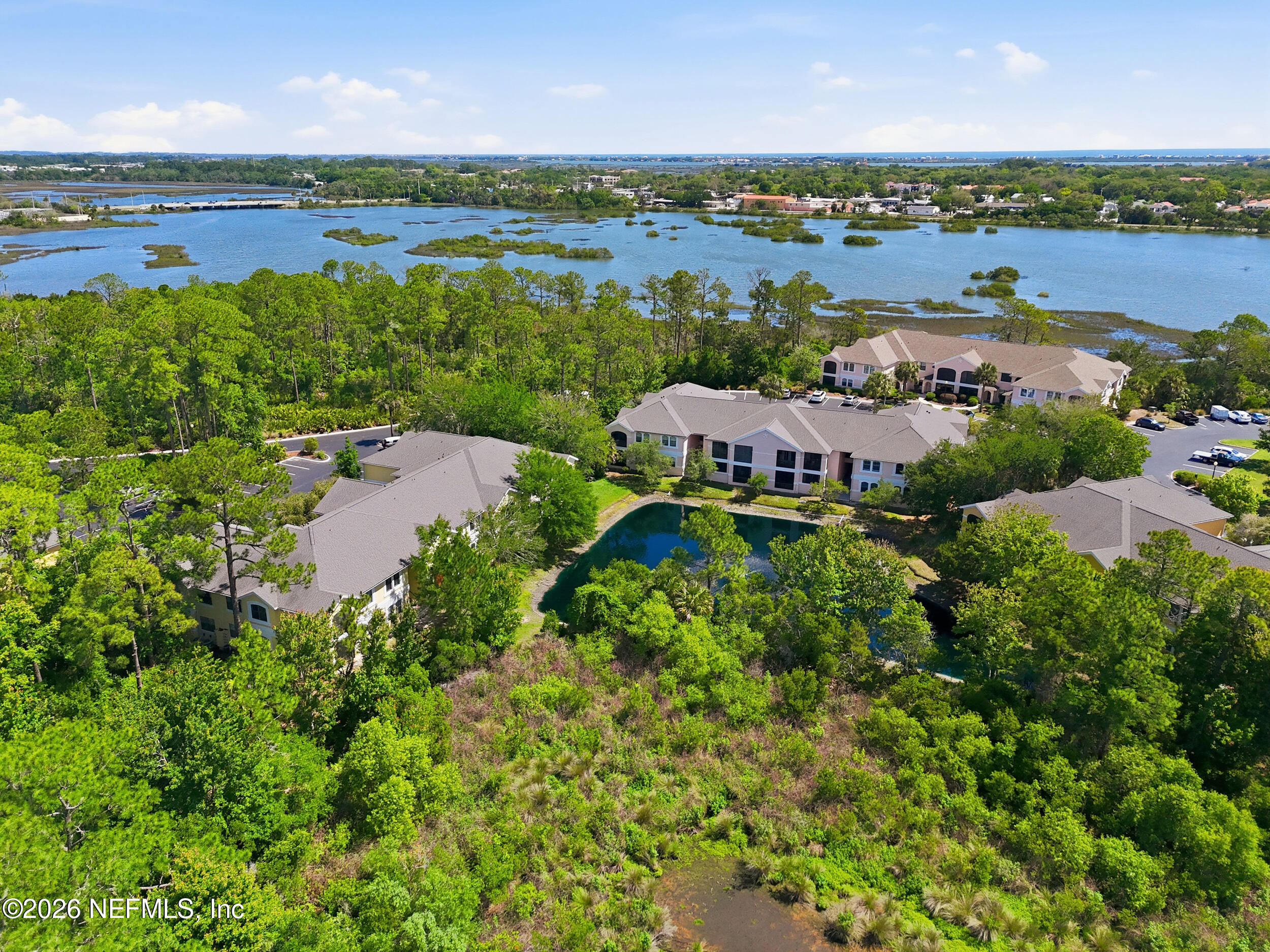 1529 Vista Cove Road St. Augustine, FL 32084 - Photo 43 of 75 an aerial view of multiple house with outdoor space and lake view
