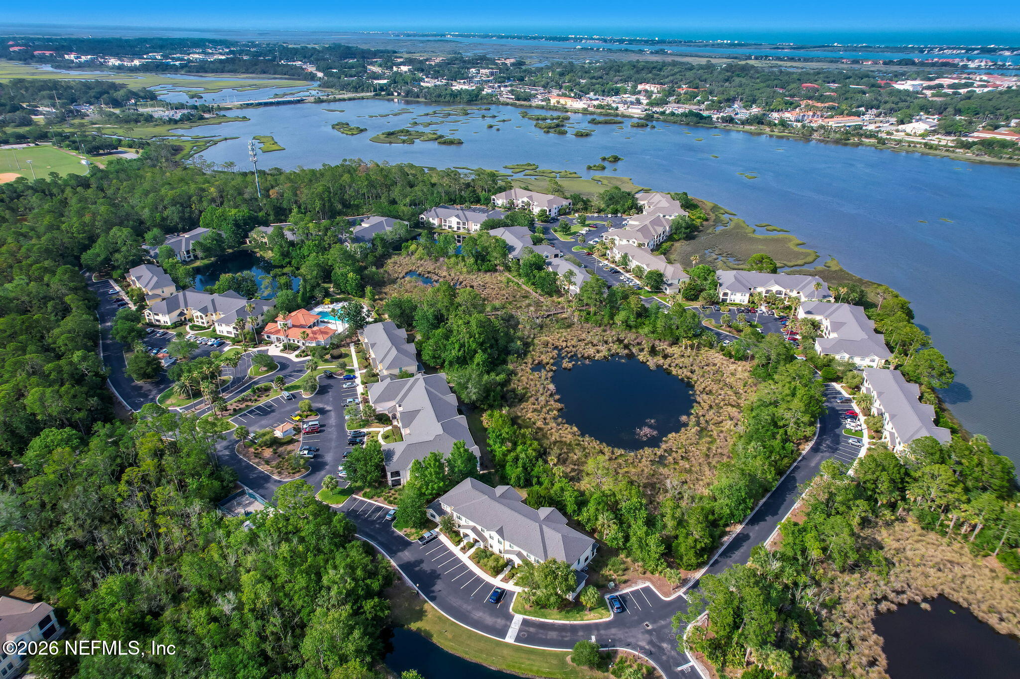 1529 Vista Cove Road St. Augustine, FL 32084 - Photo 67 of 75 an aerial view of a house with a garden and lake view