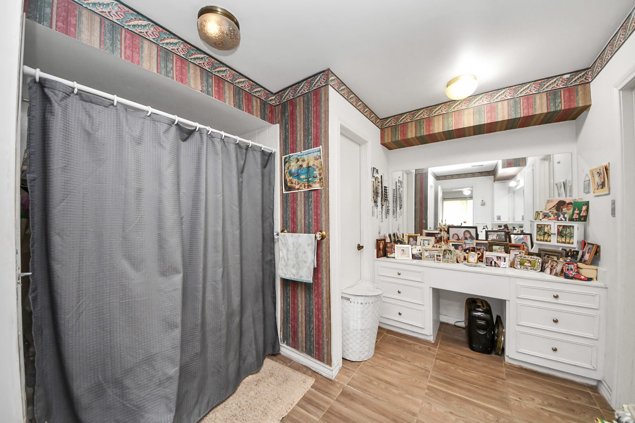 17 Winged Foot Drive Conroe, TX 77304 - Photo 16 of 46 a kitchen with a refrigerator and sink