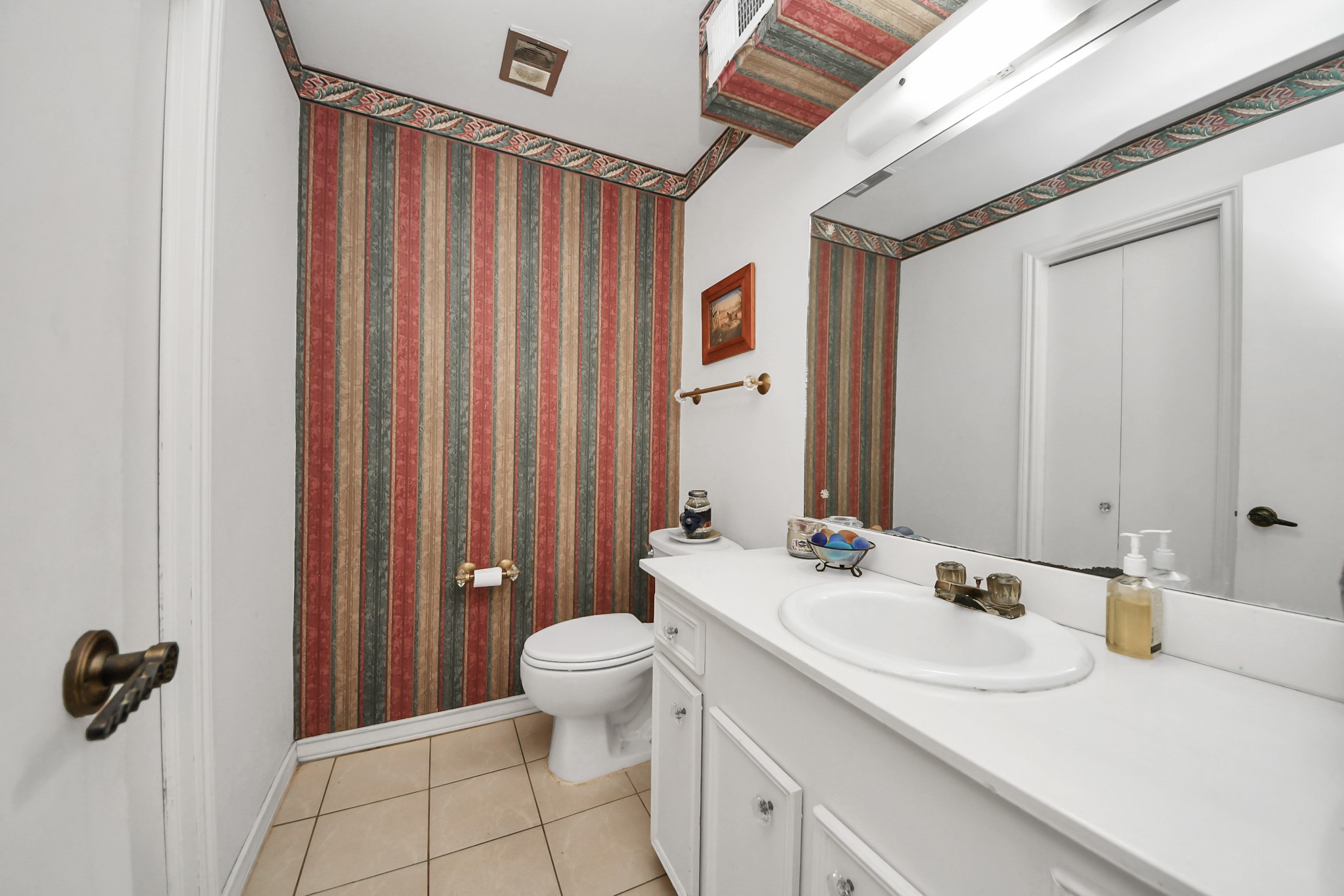 17 Winged Foot Drive Conroe, TX 77304 - Photo 18 of 46 a bathroom with a sink a toilet and shower