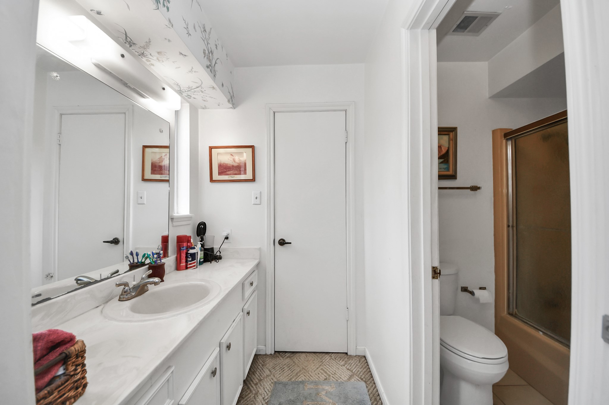 17 Winged Foot Drive Conroe, TX 77304 - Photo 28 of 46 a bathroom with a double vanity sink toilet and shower