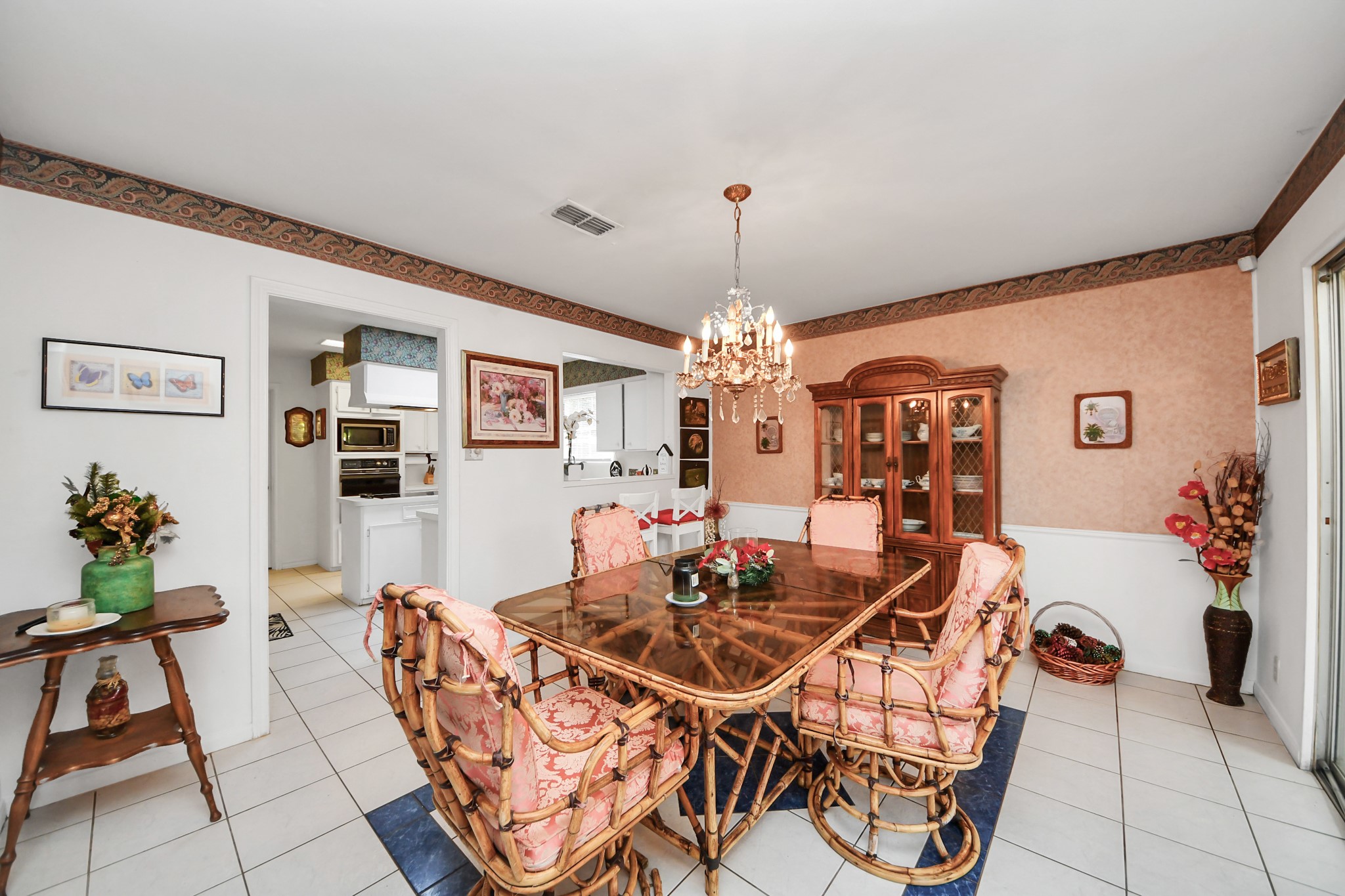 17 Winged Foot Drive Conroe, TX 77304 - Photo 41 of 46 a view of a dining room with furniture and chandelier