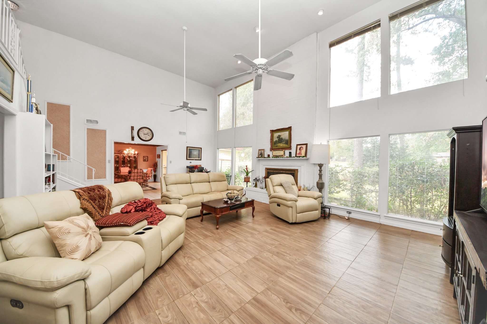 17 Winged Foot Drive Conroe, TX 77304 - Photo 9 of 46 a living room with furniture and a large window