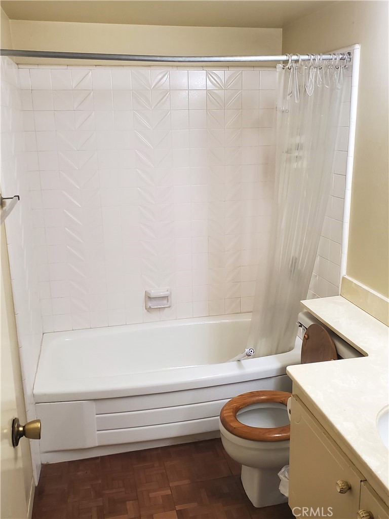 8245 Big Bear Circle Buena Park, CA 90621 - Photo 15 of 23 a bathroom with a sink a toilet and a bathtub