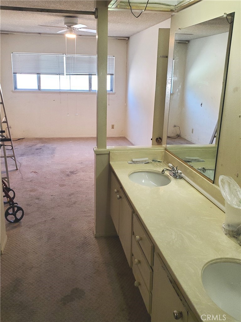 8245 Big Bear Circle Buena Park, CA 90621 - Photo 18 of 23 a bathroom with a sink and a mirror