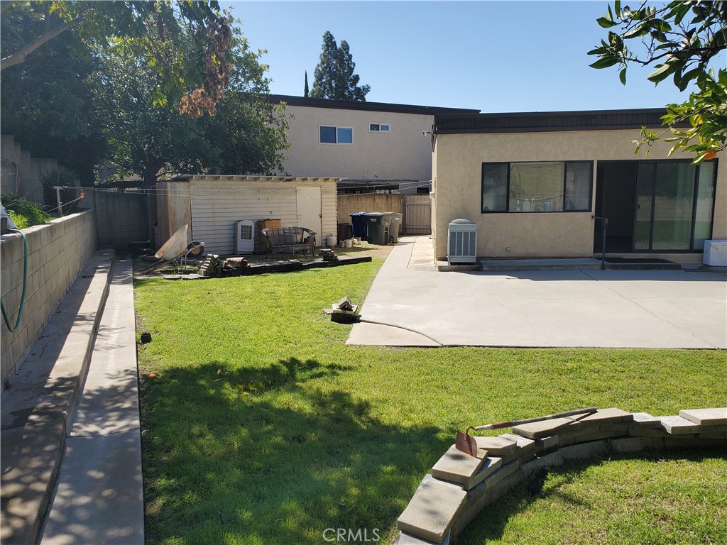 8245 Big Bear Circle Buena Park, CA 90621 - Photo 6 of 23 a view of a swimming pool with a patio
