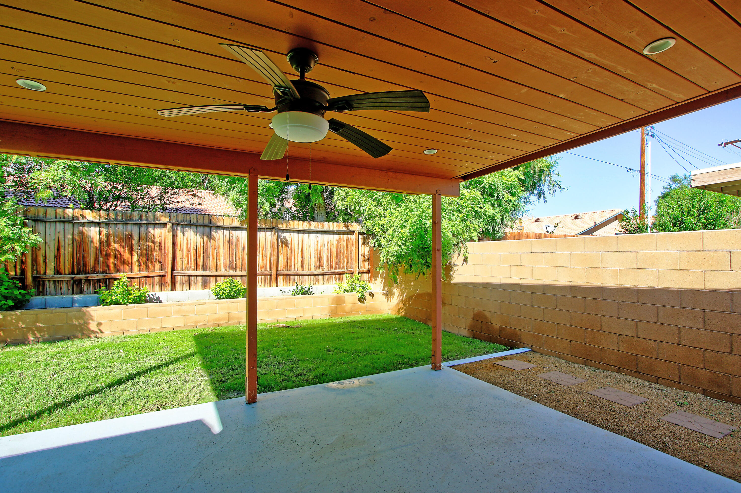 51845 Eisenhower Drive La Quinta, CA 92253 - Photo 35 of 35 a view of a backyard with a small cabin