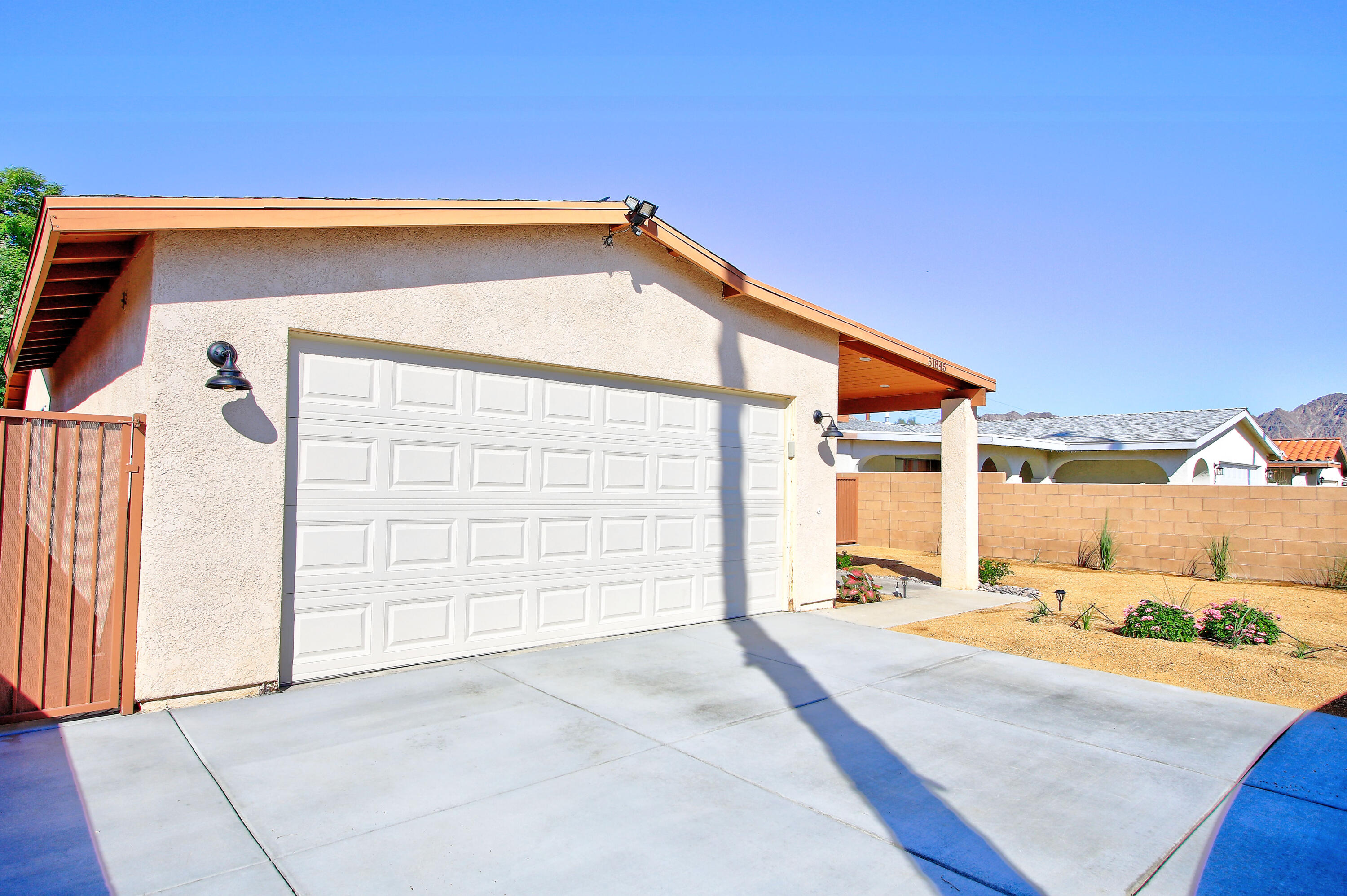 51845 Eisenhower Drive La Quinta, CA 92253 - Photo 4 of 35 a view of a house with a outdoor space