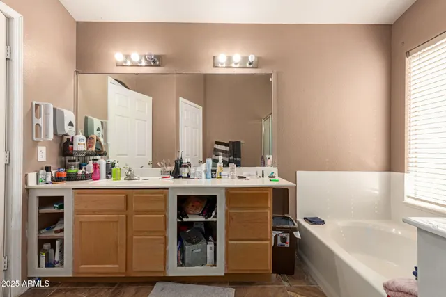 a view of a living room and kitchen