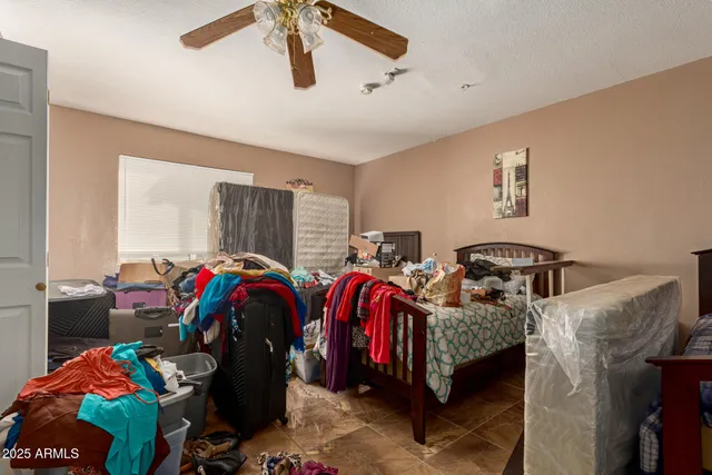 a bed room with two bed and a closet