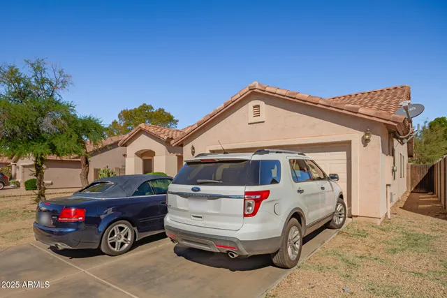 a car parked in front of a house