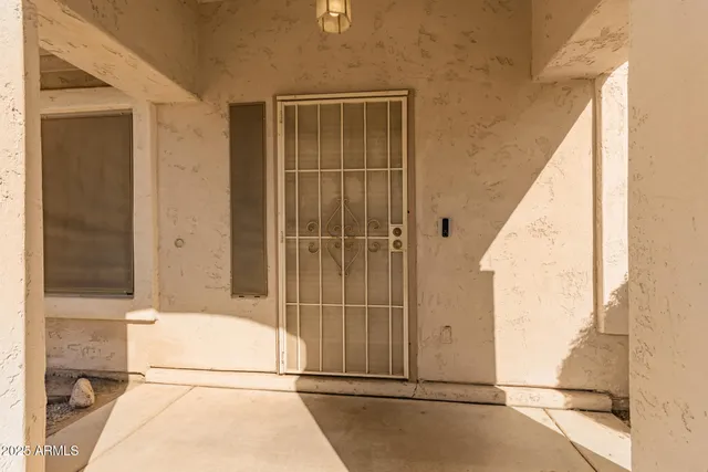 a bathroom with a tub and shower
