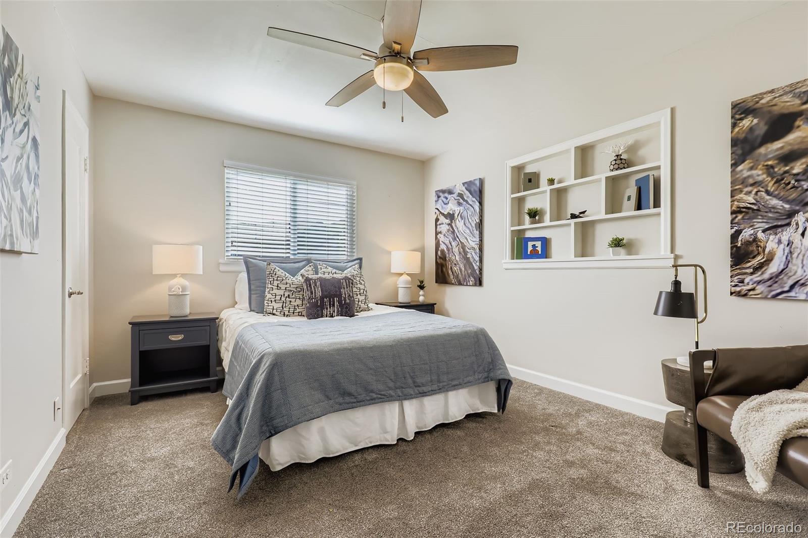 3600 East 30th Avenue Denver, CO 80205 - Photo 14 of 29 a bedroom with a bed and cabinets
