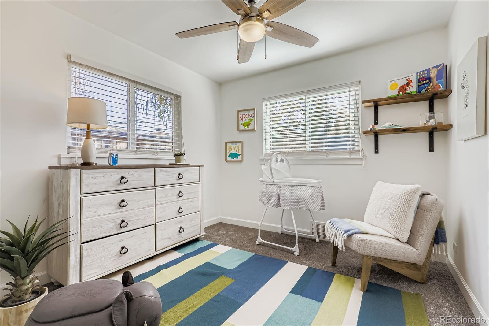 3600 East 30th Avenue Denver, CO 80205 - Photo 18 of 29 a living room with furniture and a window