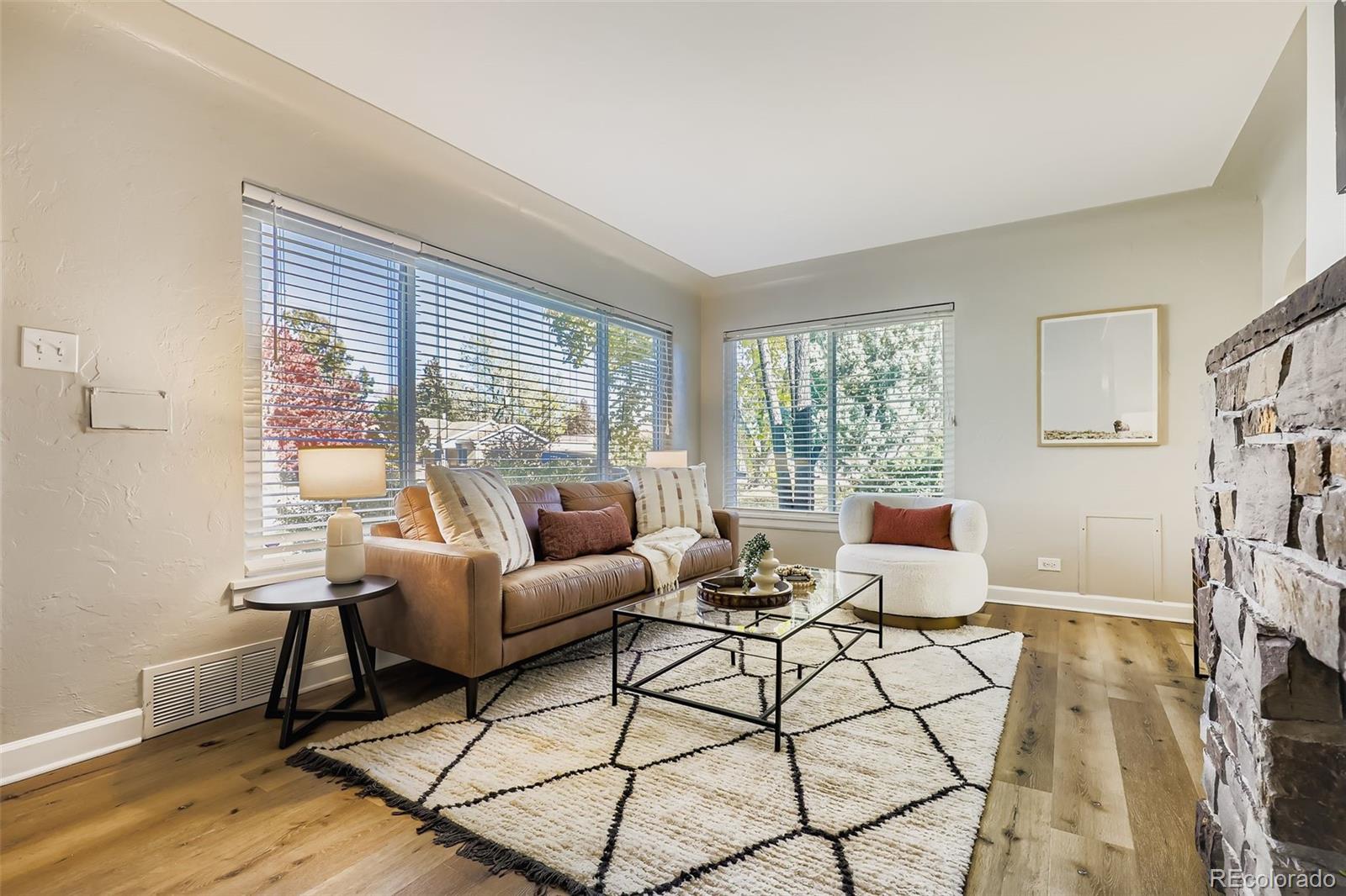 3600 East 30th Avenue Denver, CO 80205 - Photo 5 of 29 a living room with furniture and a window