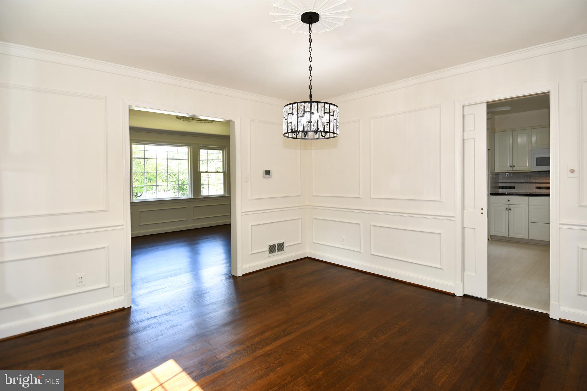 7109 Radnor Road Bethesda, MD 20817 - Photo 14 of 82 POCKET DOOR W/ ACCESS TO KITCHEN