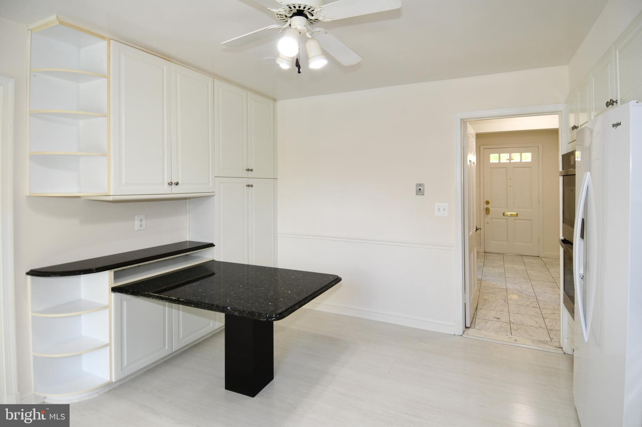 7109 Radnor Road Bethesda, MD 20817 - Photo 16 of 82 KITCHEN DOOR ACCESS TO FRONT FOYER
