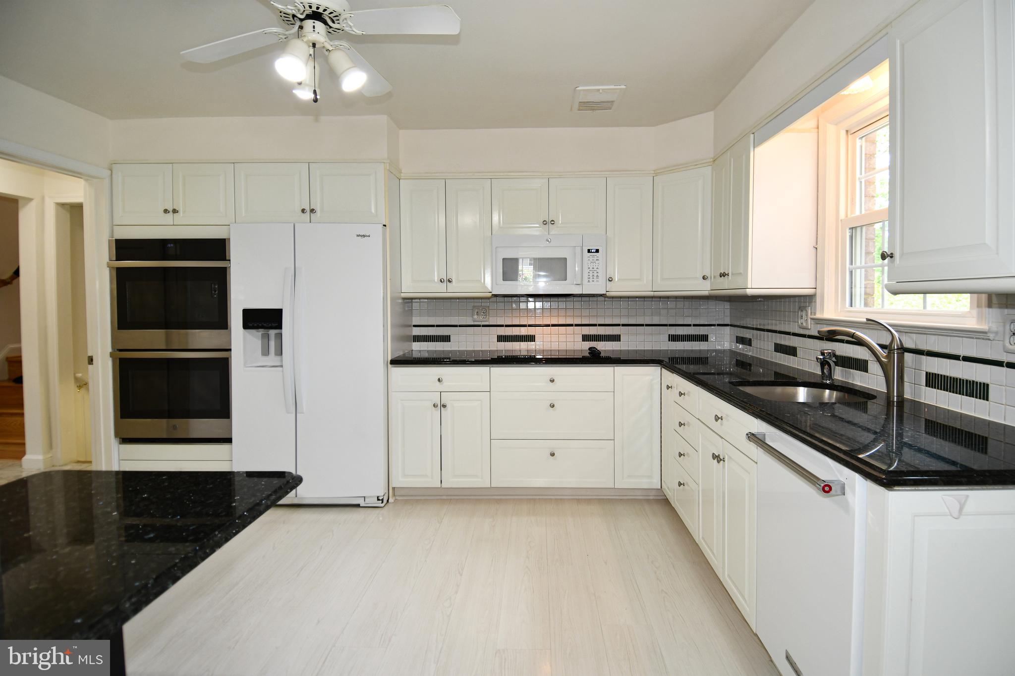 7109 Radnor Road Bethesda, MD 20817 - Photo 17 of 82 KITCHEN HAS GRANITE COUNTERTOPS