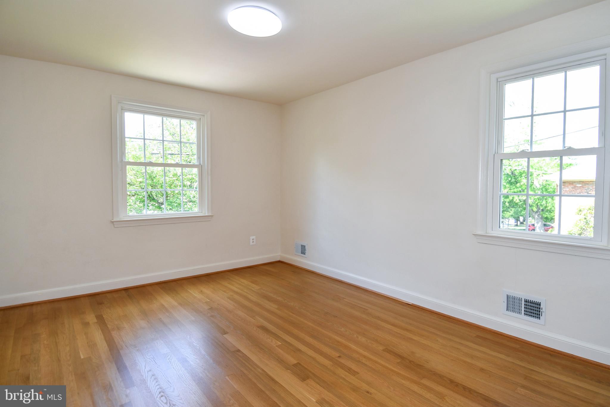 7109 Radnor Road Bethesda, MD 20817 - Photo 29 of 82 UPPER LEVEL 1 BEDROOM 2 REFINISHED HARDWOOD FLOOR