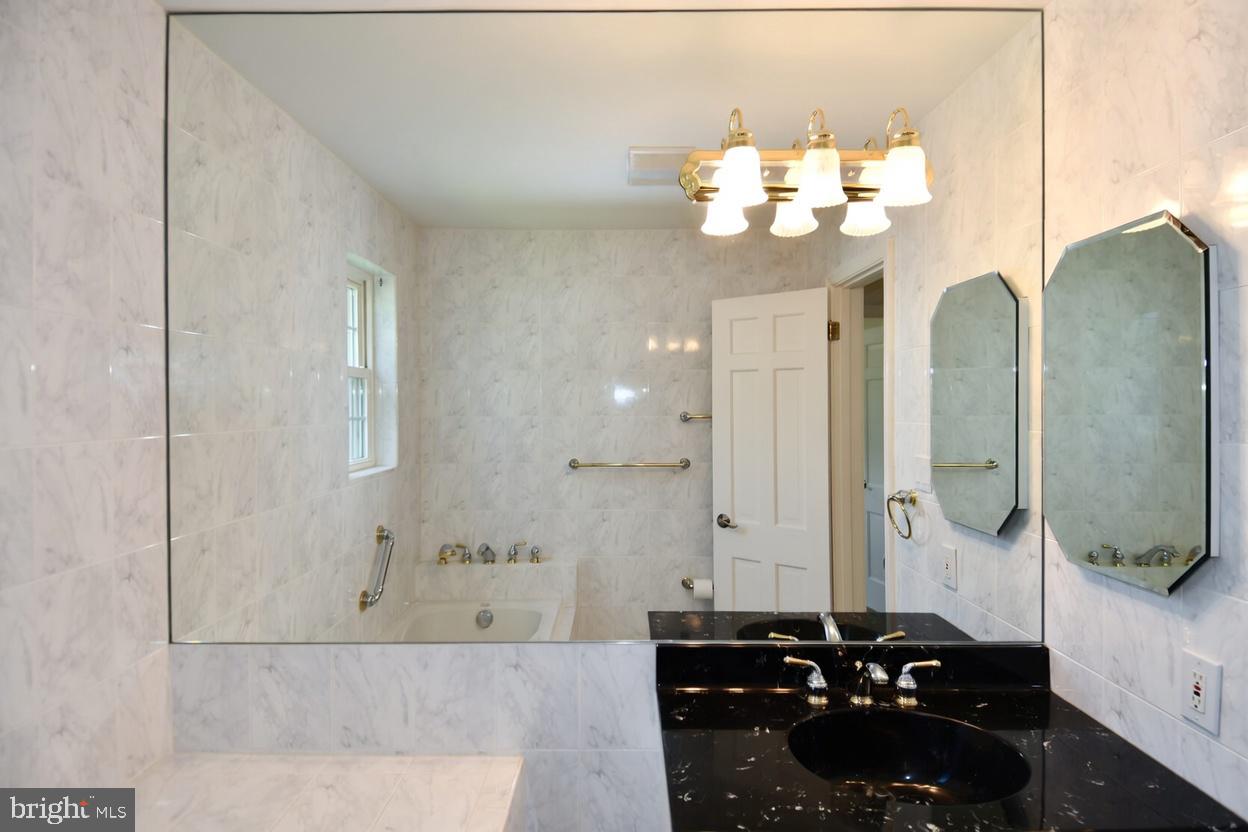 7109 Radnor Road Bethesda, MD 20817 - Photo 30 of 82 UPPER LEVEL 1 HALLWAY BATHROOM