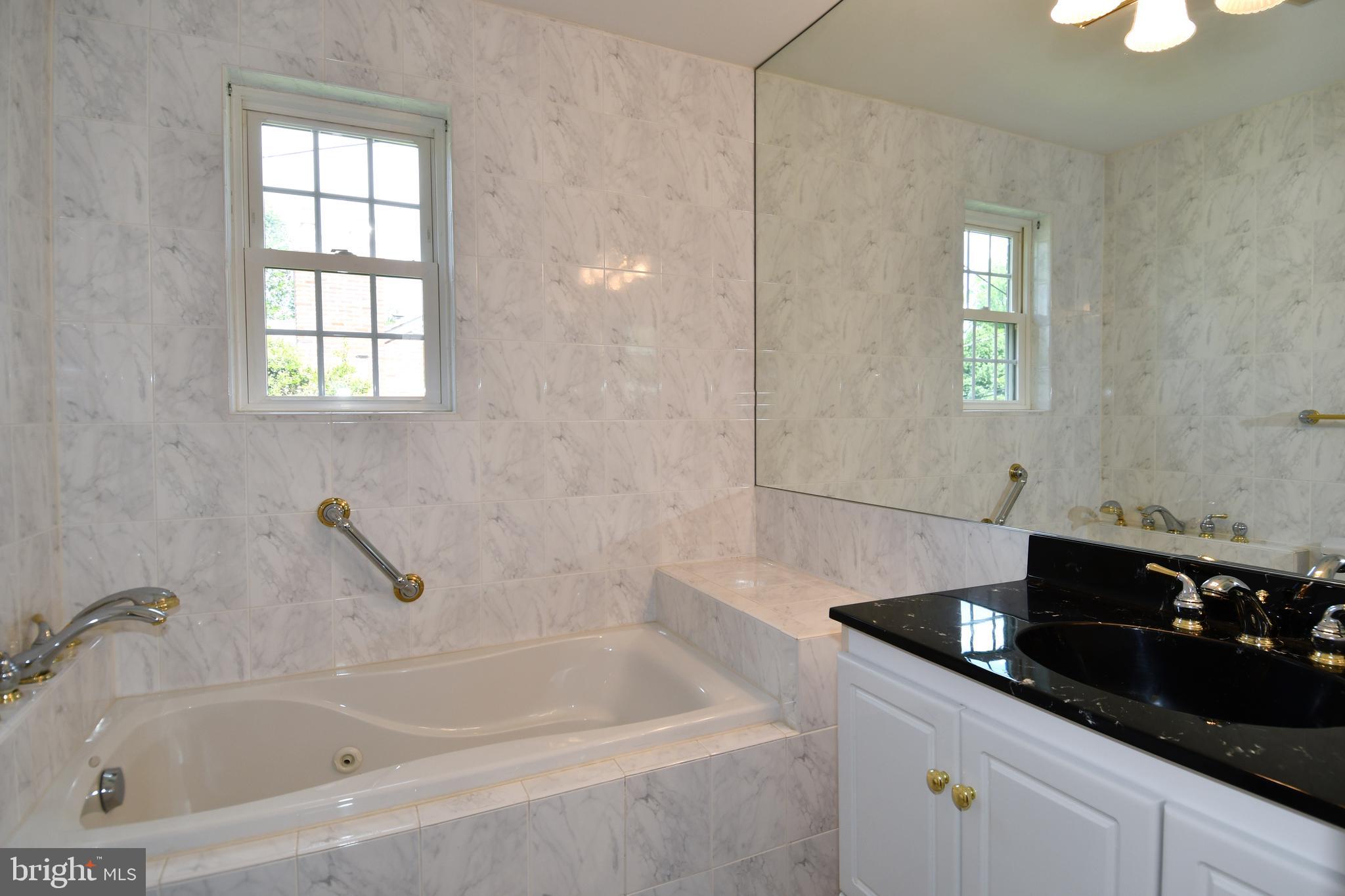 7109 Radnor Road Bethesda, MD 20817 - Photo 31 of 82 UPPER LEVEL 1 HALLWAY BATHROOM VANITY