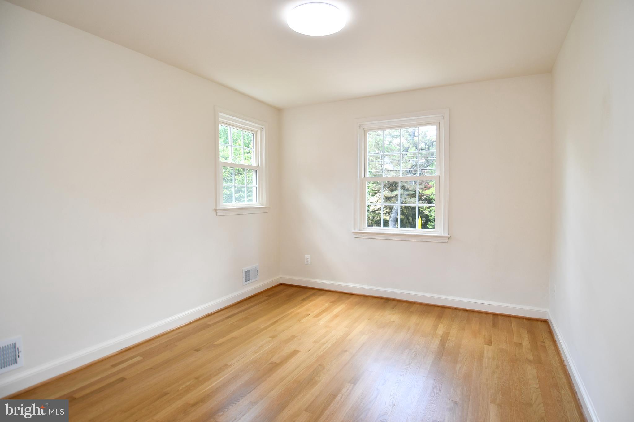 7109 Radnor Road Bethesda, MD 20817 - Photo 35 of 82 UPPER LEVEL 1 BEDROOM 3 REFINISHED HARDWOOD FLOOR
