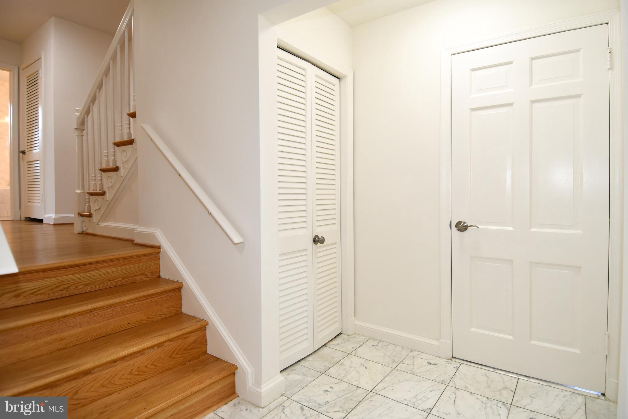 7109 Radnor Road Bethesda, MD 20817 - Photo 4 of 82 FOYER LEFT DOOR TO LL 1 & RIGHT DOOR TO KITCHEN