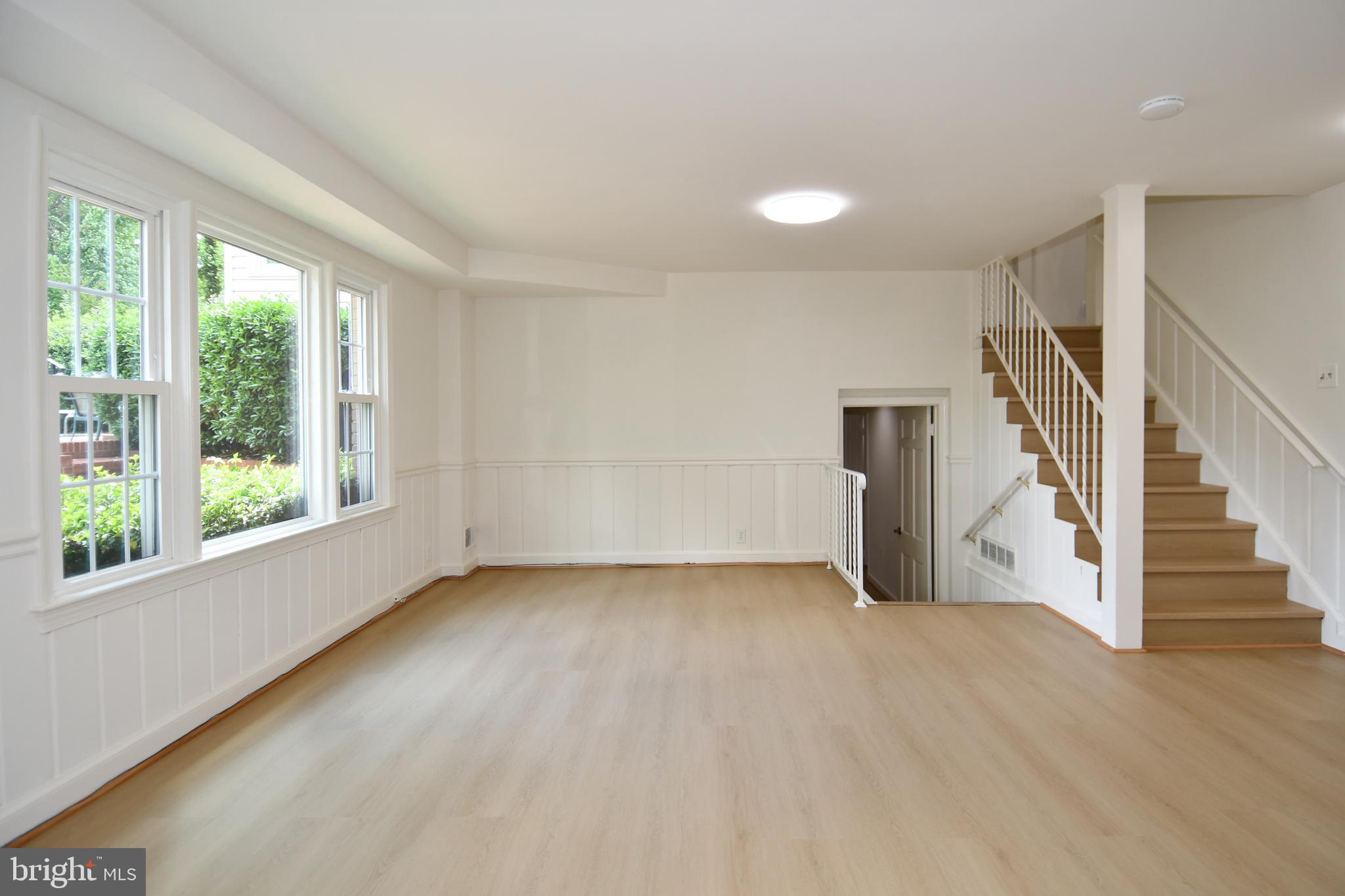 7109 Radnor Road Bethesda, MD 20817 - Photo 44 of 82 LL 1 FAM RM RIGHT OF STAIRS DOOR ACCESS TO GARAGE