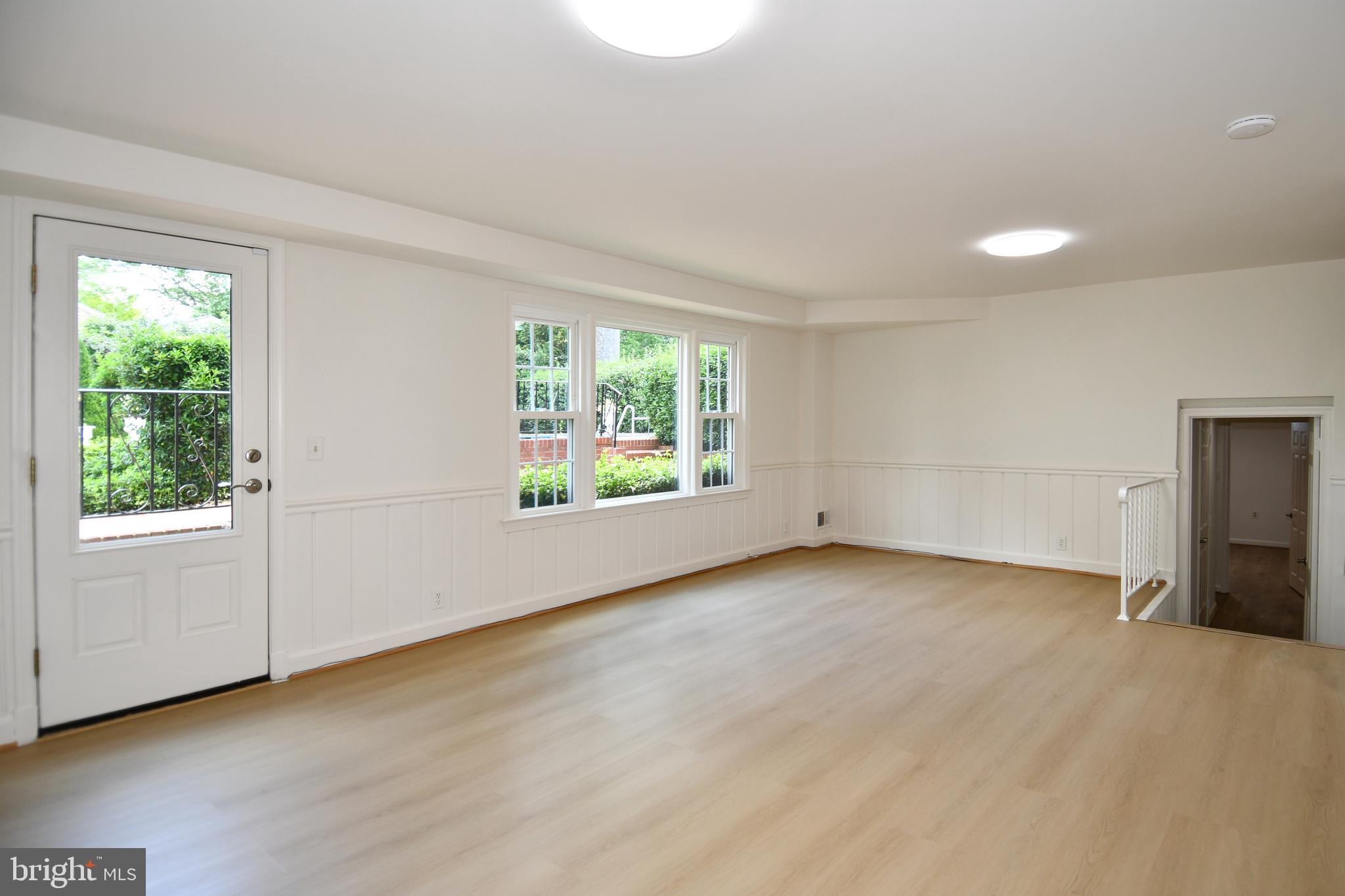 7109 Radnor Road Bethesda, MD 20817 - Photo 47 of 82 LOWER LEVEL 1 FAMILY ROOM HAS NEW LIGHT FIXTURES