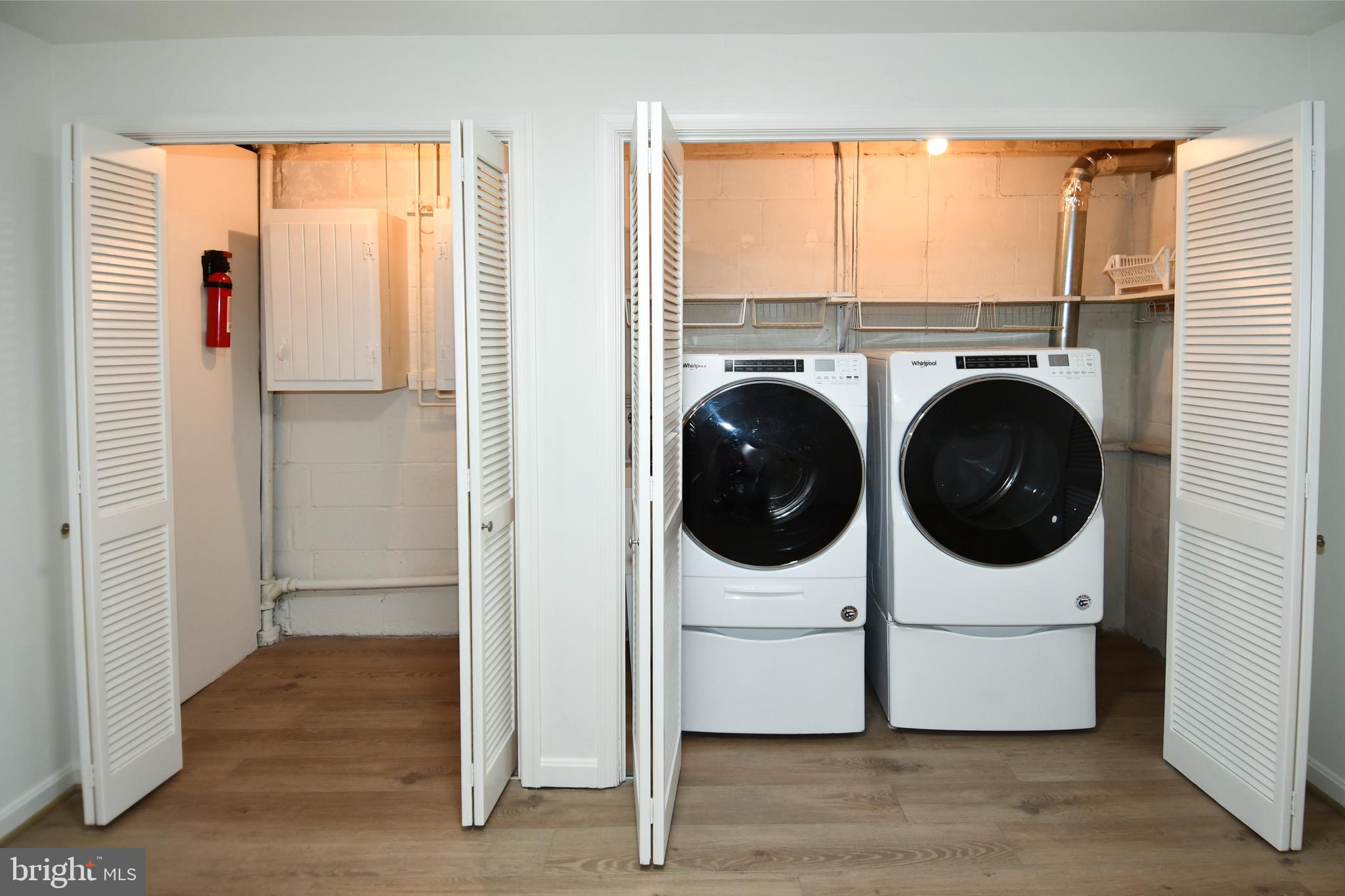 7109 Radnor Road Bethesda, MD 20817 - Photo 54 of 82 LOWER LEVEL 2 CABINET, UTILITY SINK & WASHER/DRYER