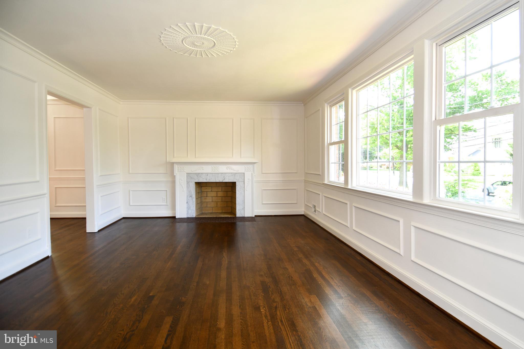 7109 Radnor Road Bethesda, MD 20817 - Photo 7 of 82 LIVING ROOM WINDOWS BRING IN NATURAL SUNLIGHT