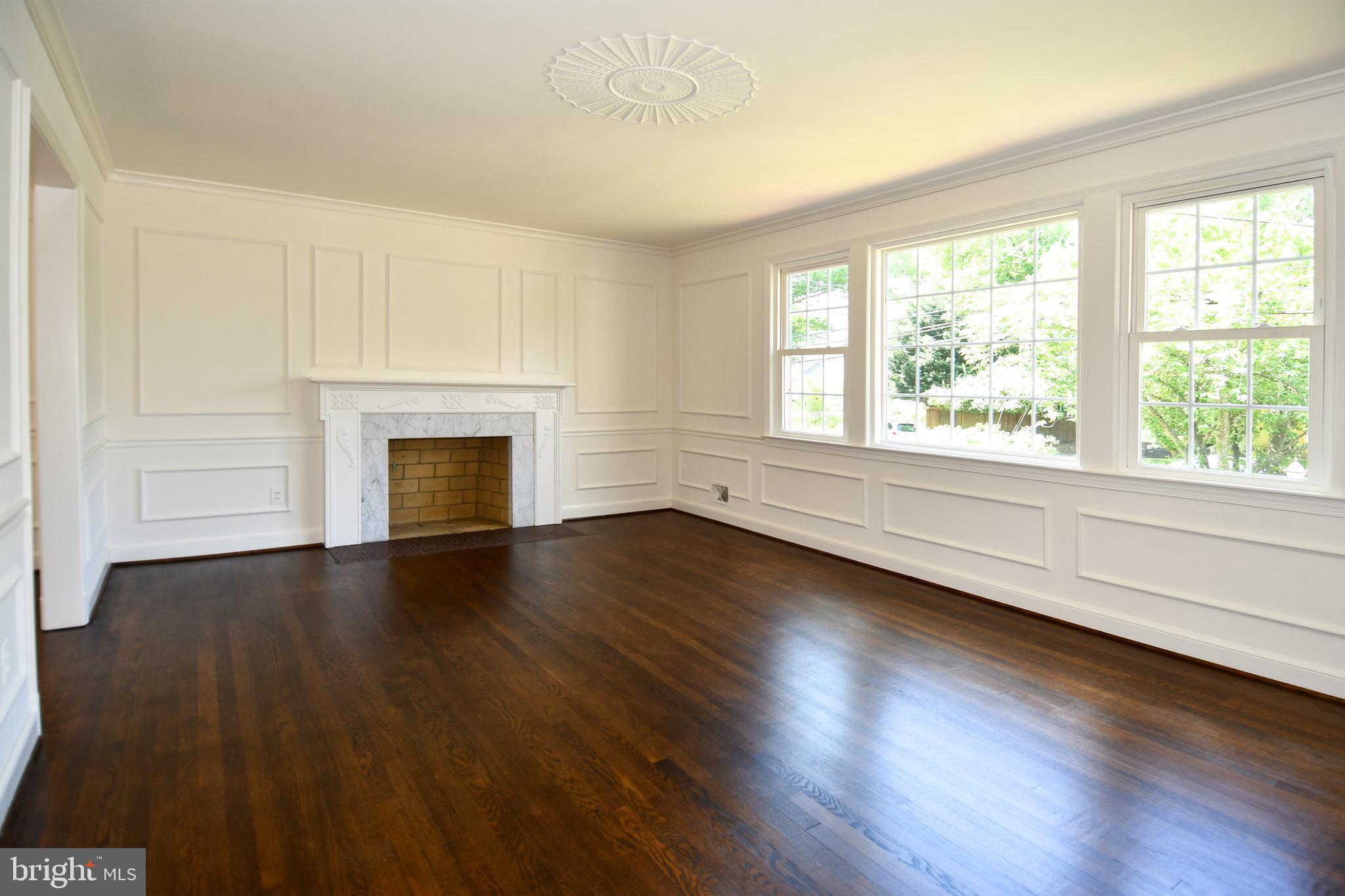 7109 Radnor Road Bethesda, MD 20817 - Photo 8 of 82 LIVING ROOM HAS REFINISHED GLEAMING HARWOOD FLOORS