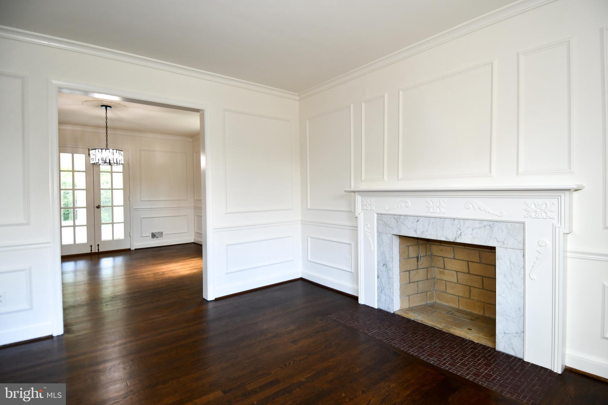 7109 Radnor Road Bethesda, MD 20817 - Photo 9 of 82 LIVING ROOM HAS WOOD BURNING FIREPLACE