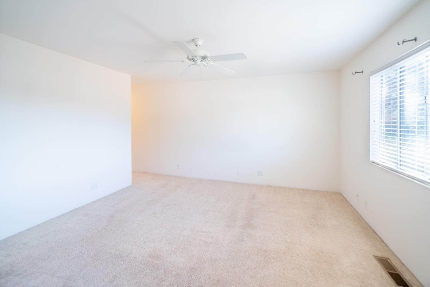 1553 Meadow Lane Mountain View, CA 94040 - Photo 14 of 28 a view of an empty room with a window
