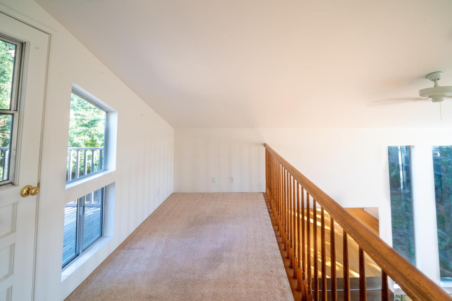 1553 Meadow Lane Mountain View, CA 94040 - Photo 16 of 28 a view of a hallway with windows