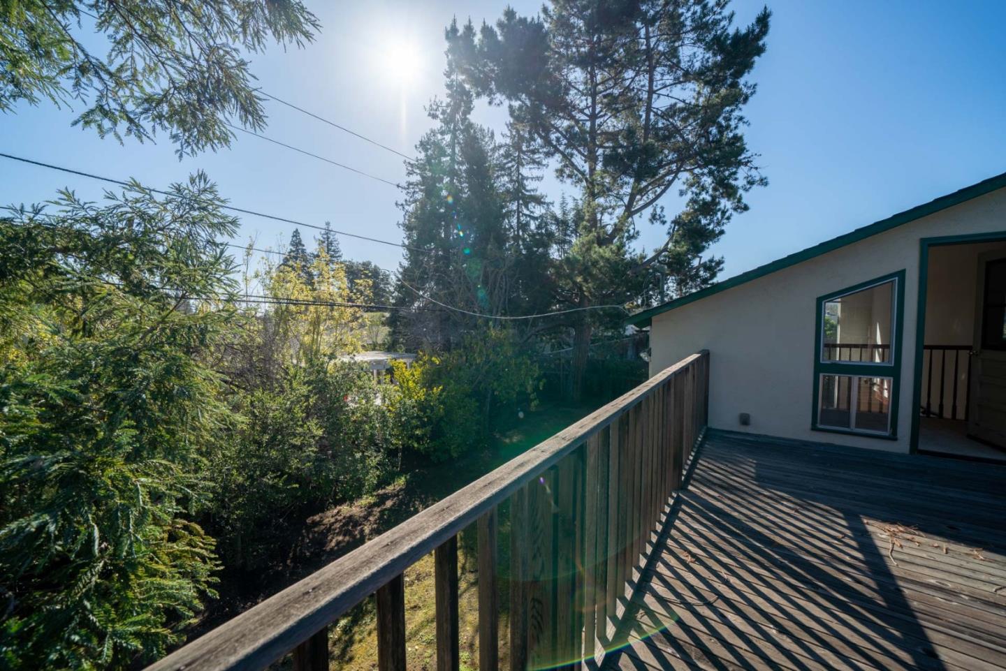 1553 Meadow Lane Mountain View, CA 94040 - Photo 18 of 28 a view of balcony with wooden floor and fence
