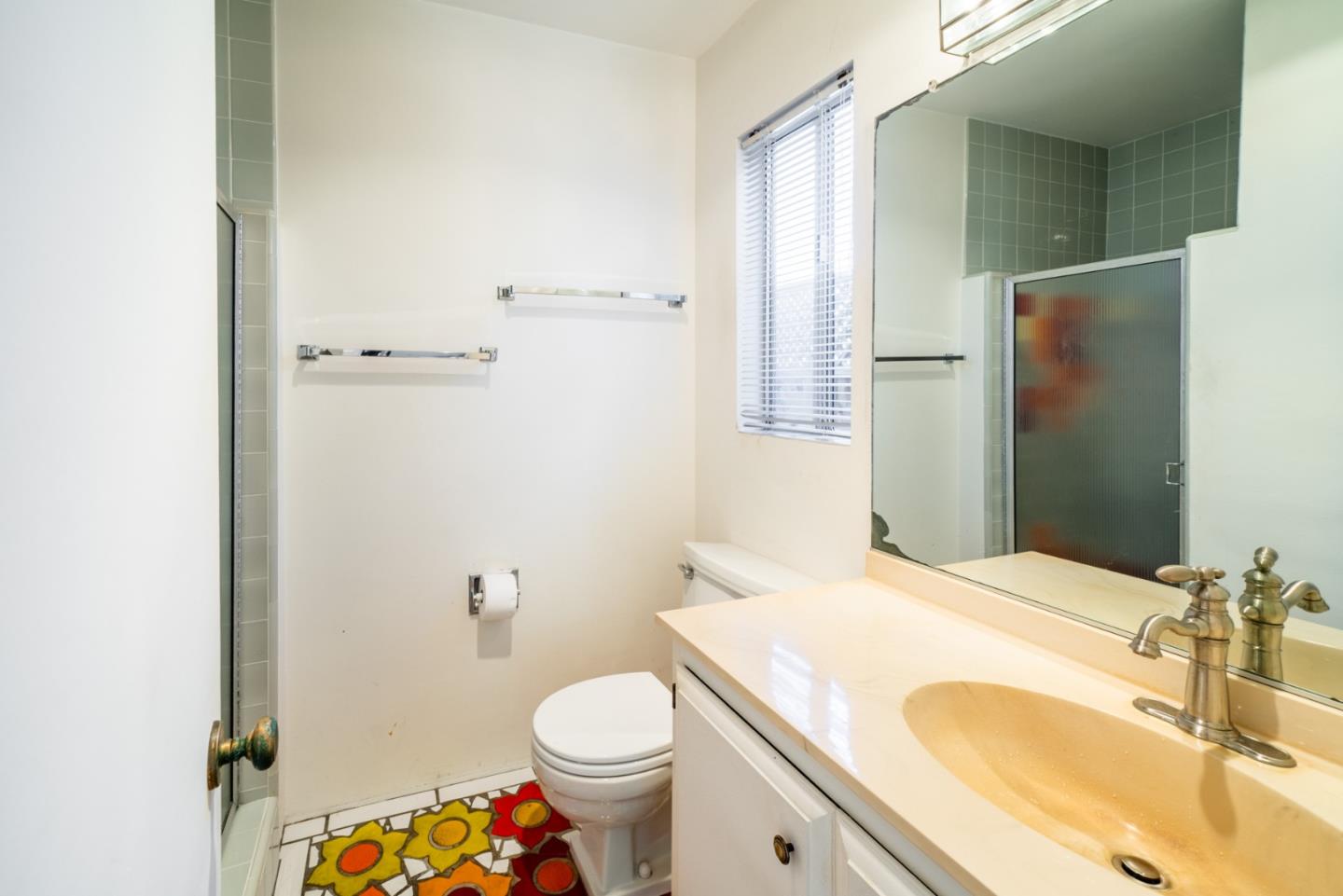 1553 Meadow Lane Mountain View, CA 94040 - Photo 21 of 28 a bathroom with a sink toilet and shower