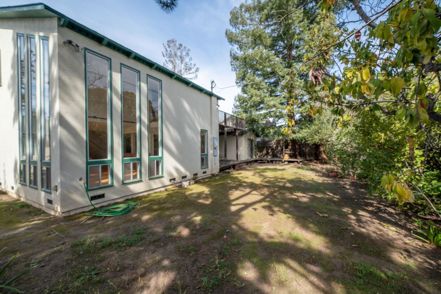 1553 Meadow Lane Mountain View, CA 94040 - Photo 26 of 28 a view of a house with a yard