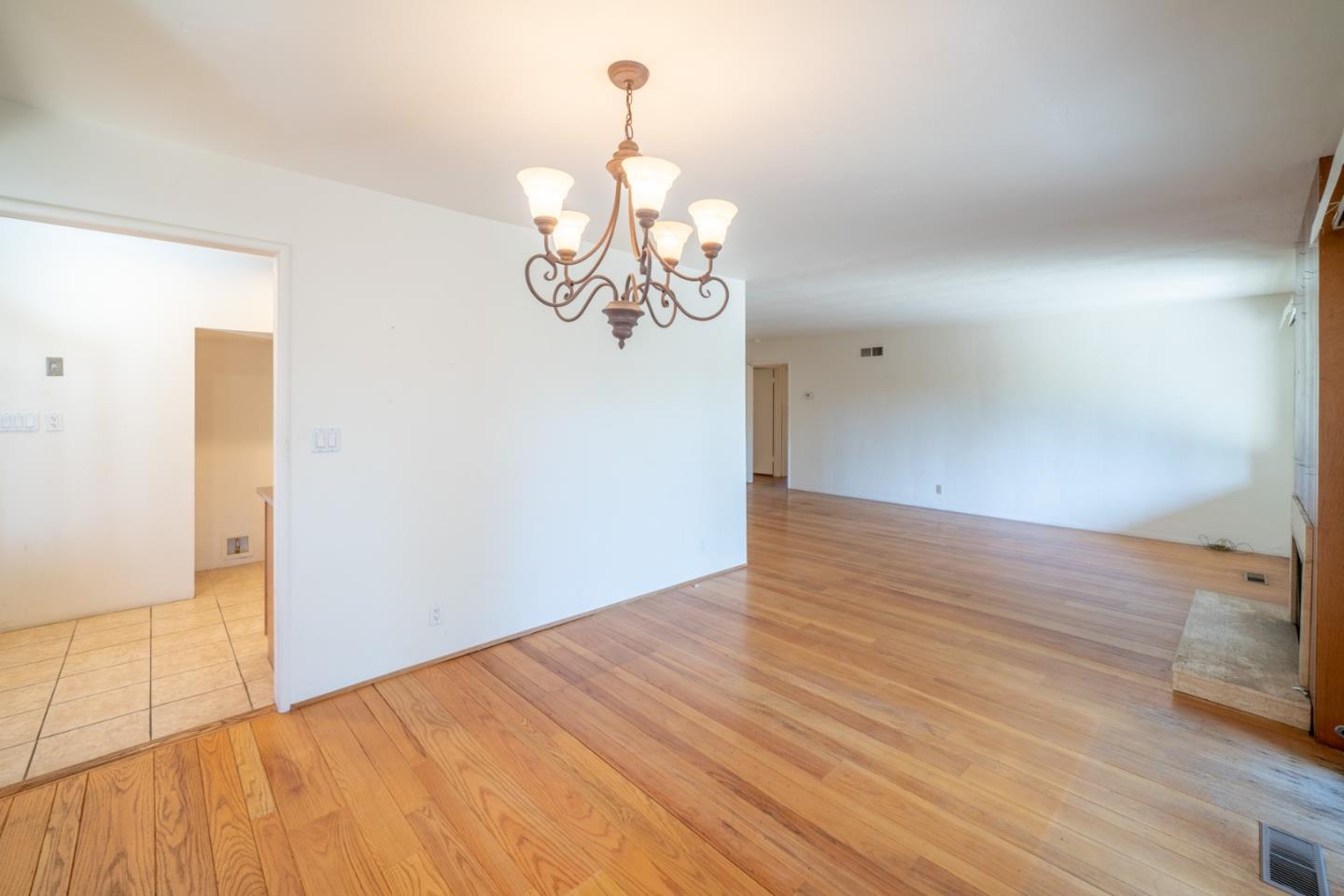 1553 Meadow Lane Mountain View, CA 94040 - Photo 6 of 28 a view of empty room with wooden floor