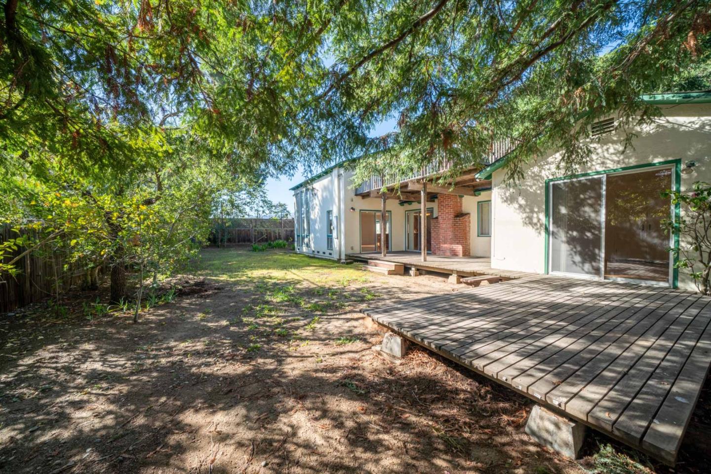 1553 Meadow Lane Mountain View, CA 94040 - Photo 10 of 28 a house with trees in front of it