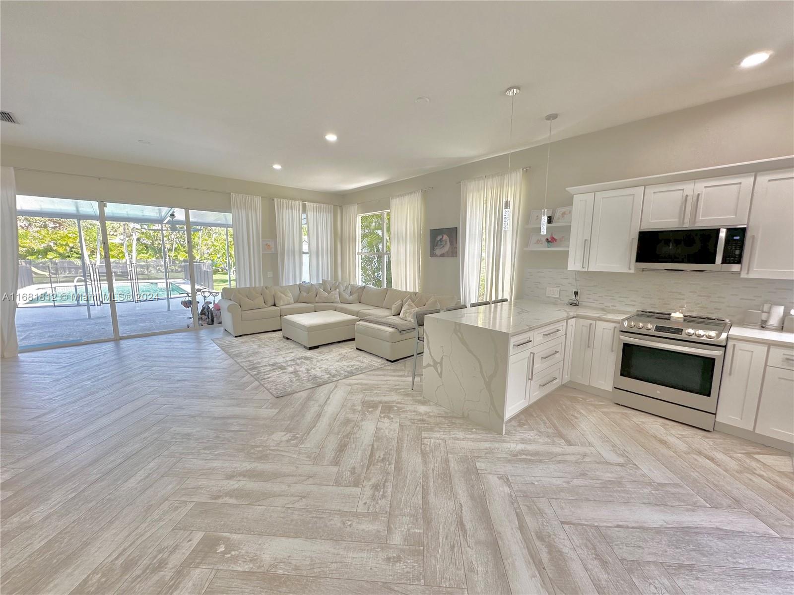 135 Hampton Circle Jupiter, FL 33458 - Photo 2 of 39 Open Concept