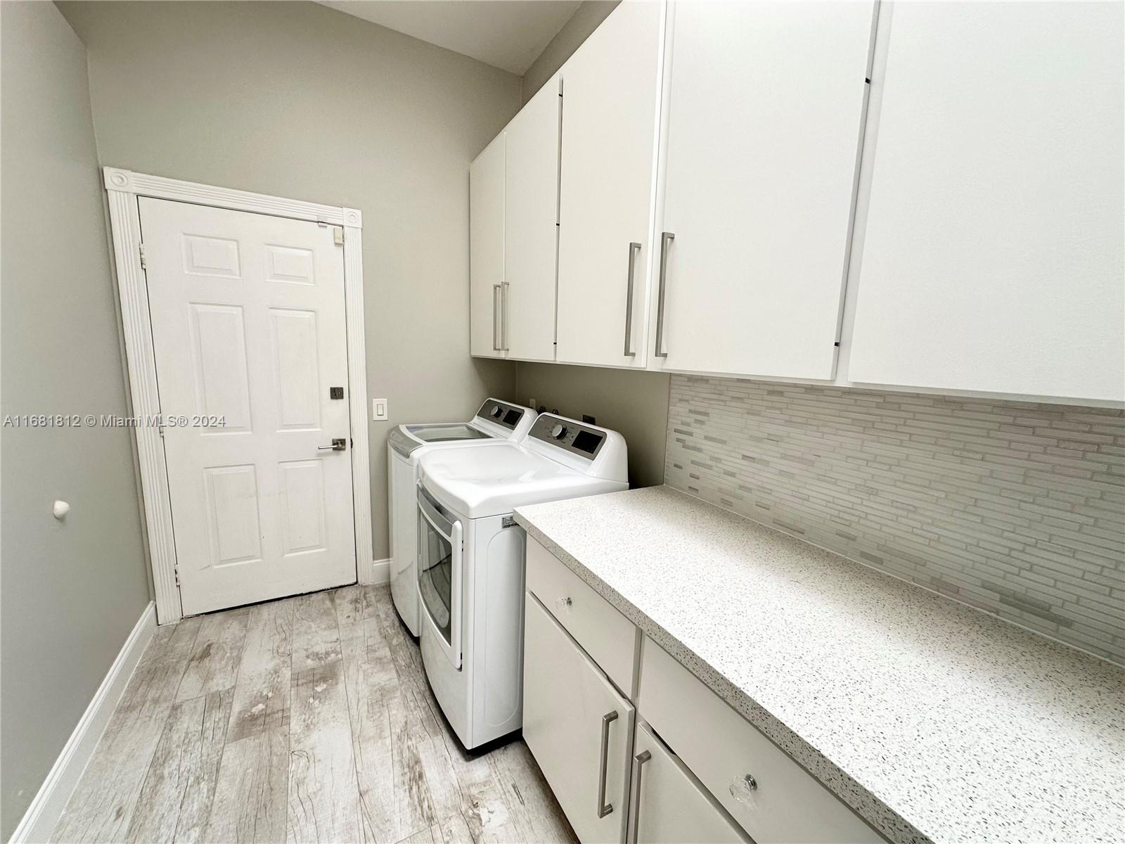 135 Hampton Circle Jupiter, FL 33458 - Photo 38 of 39 Laundry