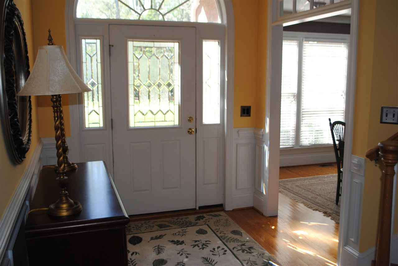 7032 Trenton Ridge Court Raleigh, NC 27613 - Photo 11 of 25 Welcoming Foyer with direct access to the large dining room area.