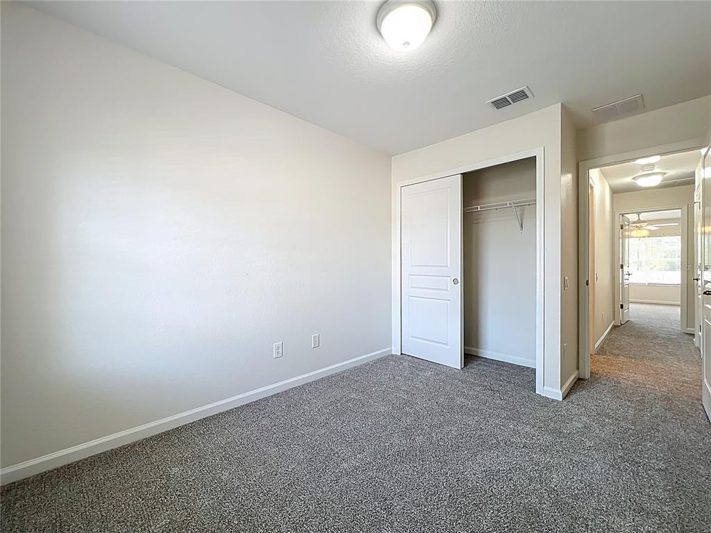 12930 Vennetta Way Windermere, FL 34786 - Photo 23 of 38 an empty room with an entryway