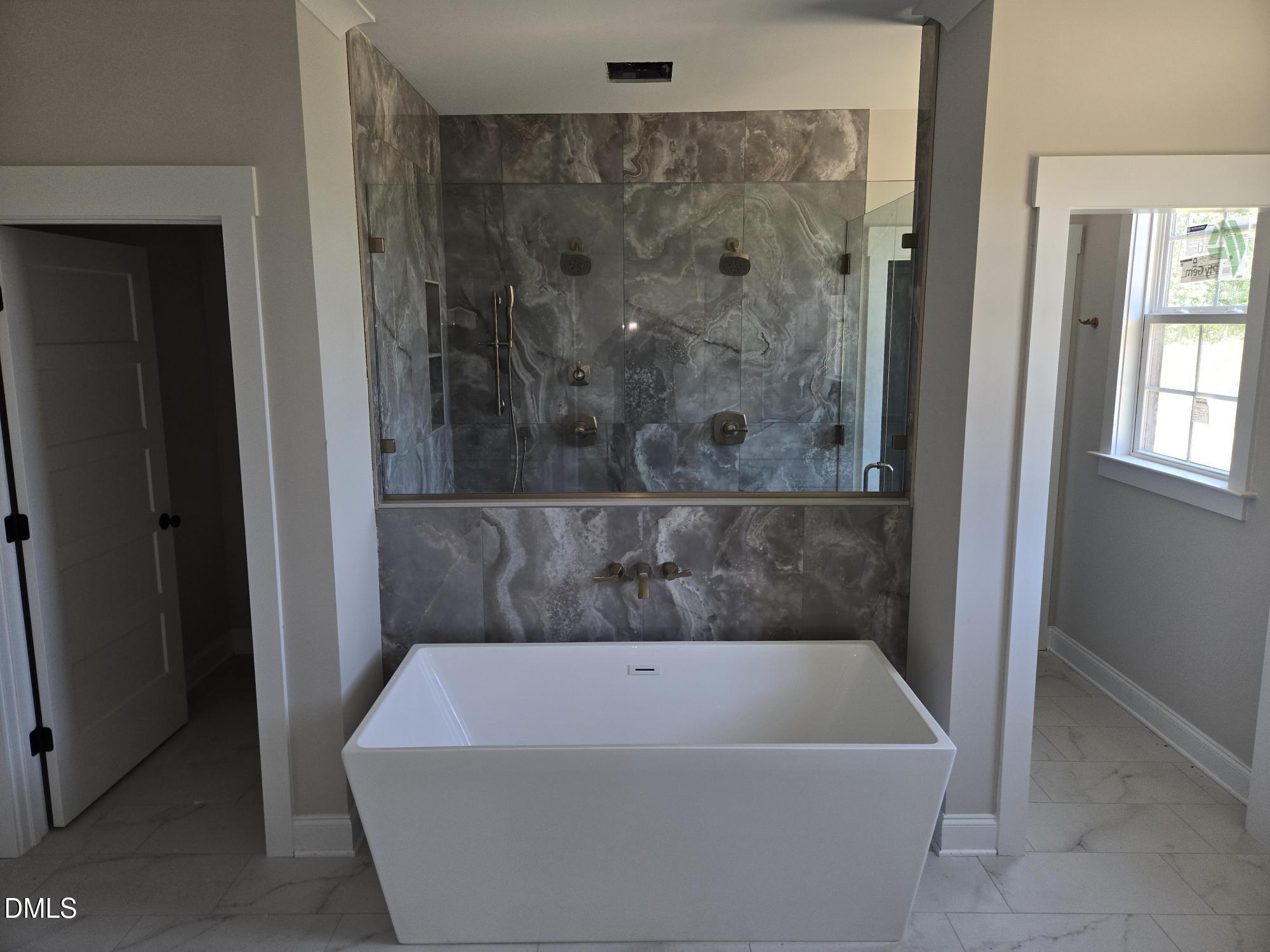 300 Avery Road Erwin, NC 28339 - Photo 28 of 38 a bathroom with a bathtub