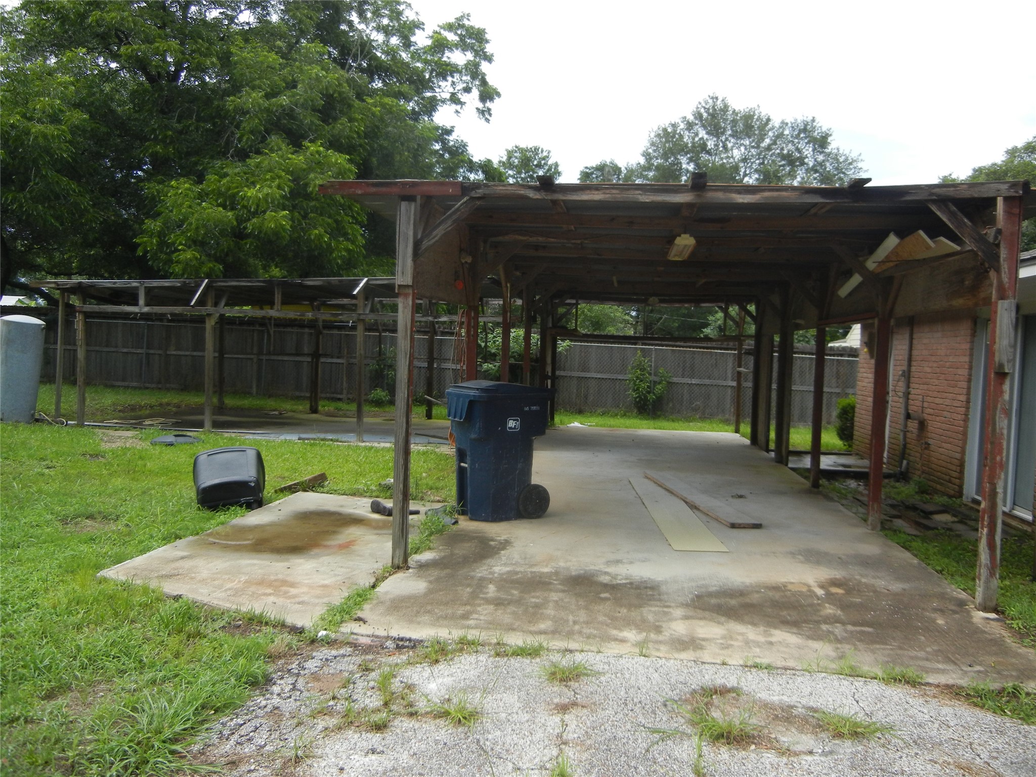 20811 Emerald Street Prairie View, TX 77484 - Photo 11 of 13 carport at rear of home